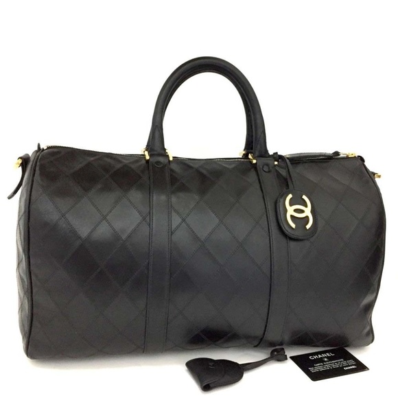Chanel Handbags - 100% Auth Chanel Bicolore Lambskin Traveling Bag